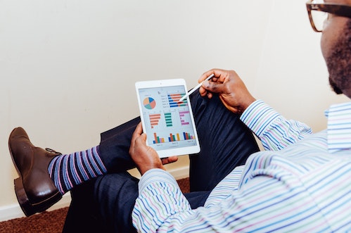 man looking at business finances